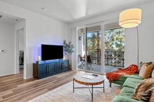 a living room with a couch and a tv at Spacious 2BDR in Marina Del Rey in Los Angeles