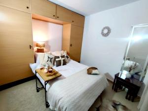Ideal Appart Marsa Les Palmiers客房内的一张或多张床位