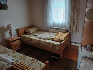 Voodi või voodid majutusasutuse Rooms Skorpijon toas