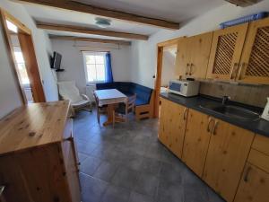 Kuchyň nebo kuchyňský kout v ubytování Apartmány Yellow