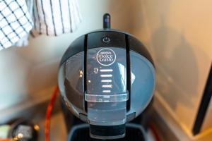 a close up of a hair dryer in a room at ART LOFTS Valencia by Benisur in Valencia