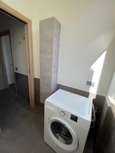 Kép Trilocale Giglio, in residence con piscina szállásáról Marcelliben a galériában