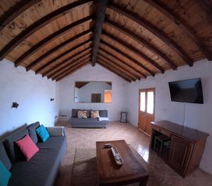 Telewizja i/lub zestaw kina domowego w obiekcie Casa Rural Muchichafe