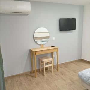 TV in/ali zabaviščno središče v nastanitvi Good Vibes - Lagos Guesthouse