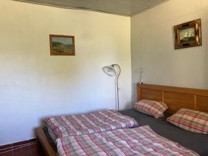 Postel nebo postele na pokoji v ubytování Gemütliches Häuschen an der Westküste Rügens