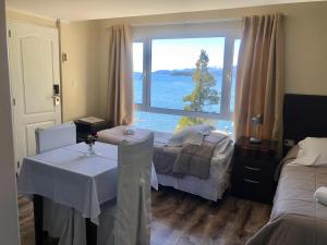 Postel nebo postele na pokoji v ubytování Sol del Nahuel - Hotel & Spa