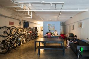 a group of people sitting in a room with bikes at 1080 Folsom Residences in San Francisco