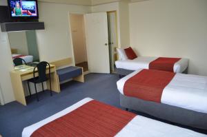Postel nebo postele na pokoji v ubytování Devere Hotel