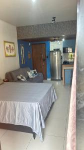 Cama ou camas em um quarto em Maresia 7B