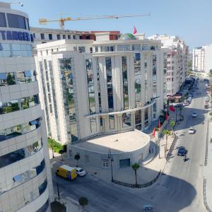 an overhead view of a large building in a city at Beautiful Apartment in centre ville M2 in Tangier