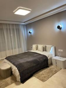 Кровать или кровати в номере Trendy apartment two bedrooms +12 фотографий