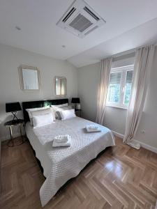 Postel nebo postele na pokoji v ubytování Apartment IslandSea - high end retreat with breathtaking sea views
