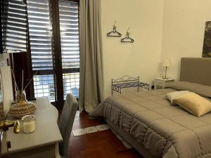 Postel nebo postele na pokoji v ubytování B&B IL CONTE