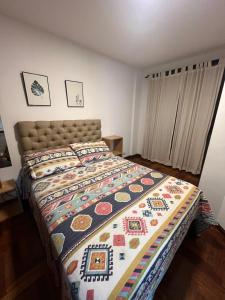 Postel nebo postele na pokoji v ubytování Palacio 210 - Plaza España - Nueva Córdoba - 2 dormitorios