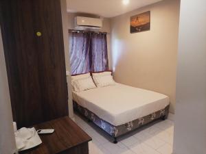 Ένα ή περισσότερα κρεβάτια σε δωμάτιο στο Double Bed
