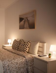 Ένα ή περισσότερα κρεβάτια σε δωμάτιο στο Just4u Apartment