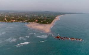 an aerial view of an island in the ocean at C Beyond Nilaveli in Nilaveli