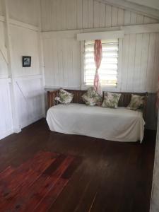 Postel nebo postele na pokoji v ubytování New Mavida Lodge