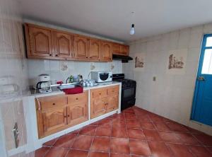 Кухня или мини-кухня в Casa completa a 10 min de Teziutlan.
