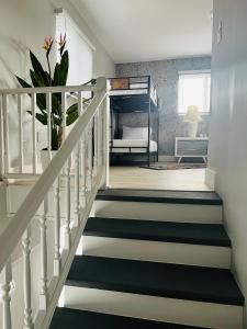 a room with a staircase with a bed at Casita Guayaba in Miami