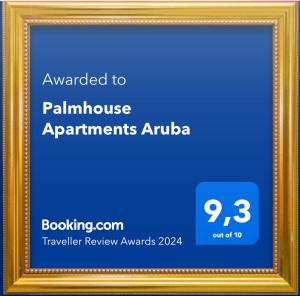 a picture frame with the text awarded to palaminate arguments arbia at Palmhouse Apartments Aruba in Savaneta