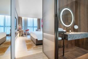 Letto o letti in una camera di Echeng Hotel - Huawei Base Store in Shenzhen