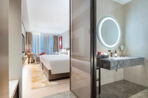 Letto o letti in una camera di Echeng Hotel - Huawei Base Store in Shenzhen