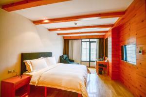 Letto o letti in una camera di 张家口云顶大酒店