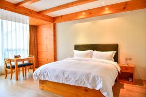 Letto o letti in una camera di 张家口云顶大酒店