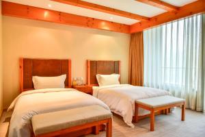 Letto o letti in una camera di 张家口云顶大酒店