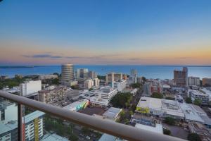 an aerial view of a city with the ocean at 'High-Top Retreat' City Chic With Ocean Outlooks in Darwin