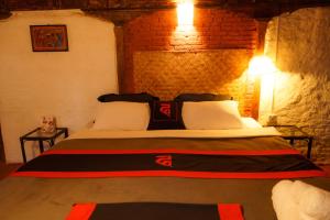 Letto o letti in una camera di Hira Guest House