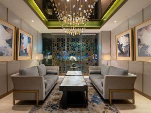 Posezení v ubytování Hotel Santika Premiere Gubeng Surabaya