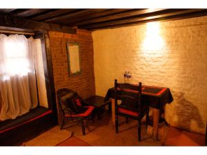 Area soggiorno di Hira Guest House