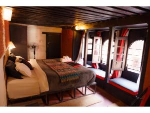Letto o letti in una camera di Hira Guest House