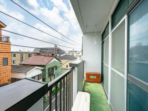 En balkon eller terrasse på Murata Corpo 301