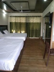 Lova arba lovos apgyvendinimo įstaigoje Sitapur prithvi yatra hotels kedarnath