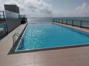 a swimming pool on the top of a cruise ship at Fun-Ocean-Chill in Negombo