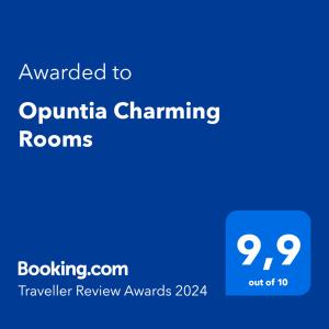 una señal azul con el texto otorgado a las habitaciones del canal ontina en Opuntia Charming Rooms, en Taormina