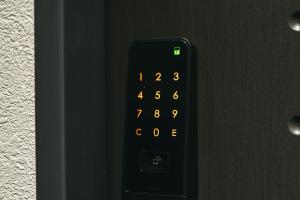 a black remote control with a clock on it at TAPSTAY HOTEL - Vacation STAY 35235v in Saga