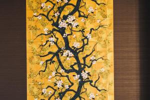 a painting of a tree with flowers on a yellow background at TAPSTAY HOTEL - Vacation STAY 35230v in Saga