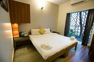 Postel nebo postele na pokoji v ubytování Hotel Bela Goa + 14 fotografií