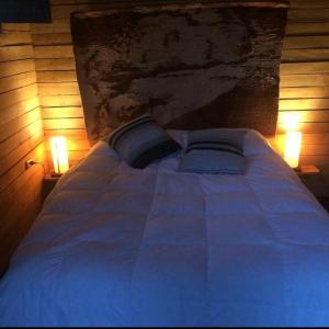 Ліжко або ліжка в номері Australlodge