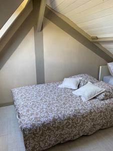Giường trong phòng chung tại Gîte la Casita