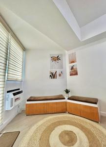 a bedroom with a large bed and a large rug at Condo At Azure North San Fernado in San Fernando