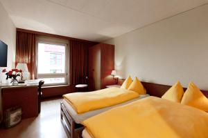 Voodi või voodid majutusasutuse Hotel Thurgauerhof Self-Check-in toas