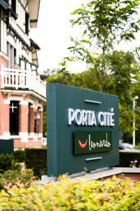 a sign for a pararia cafe in front of a building at Porta Cité in Maasmechelen