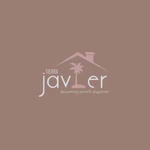 a logo for a real estate agency at Tierra Javier in Angeles