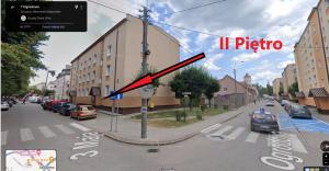 a rendering of a city street with a red arrow at Mazury Szczytno - Apartamenty u Krzyżaka - Centrum in Szczytno