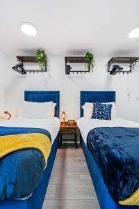 Llit o llits en una habitació de Kunda House Pershore 1257